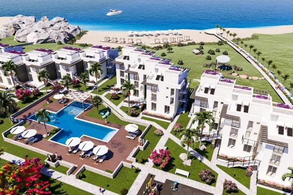 LOFT FLAT FOR SALE FROM A PROJECT WITH A PRIVATE BEACH IN GIRNE KÜÇÜKERENKÖY AREA